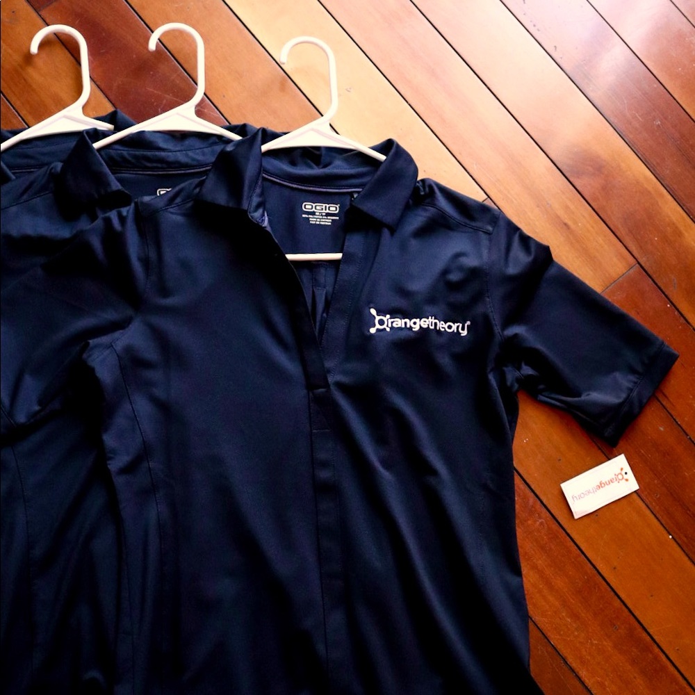 Orangetheory black women’s polo, brand new, size XS